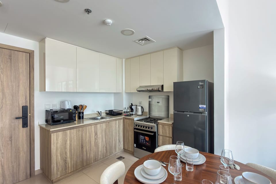 Deluxe Apartment, Balcony, Pool View | Private kitchen | Espresso maker, coffee/tea maker