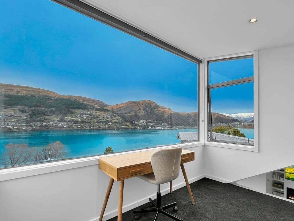 Dedicated workspace with panoramic views across Lake Wakatipu.
