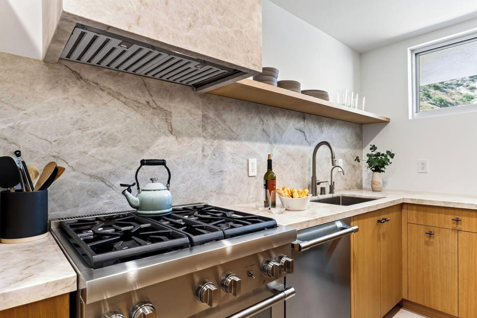 Well-appointed kitchen featuring full-size appliances.