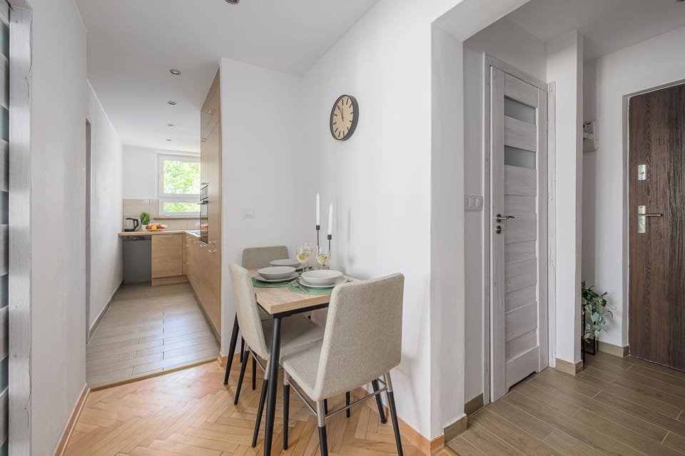 Classic Apartment, 2 Bedrooms, Courtyard View | Private kitchen | Electric kettle, highchair, griddle, eco-friendly cleaning products