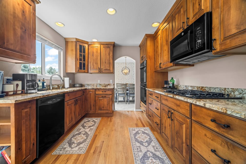 Well-appointed kitchen offers generous workspace and an easy layout for cooking together.