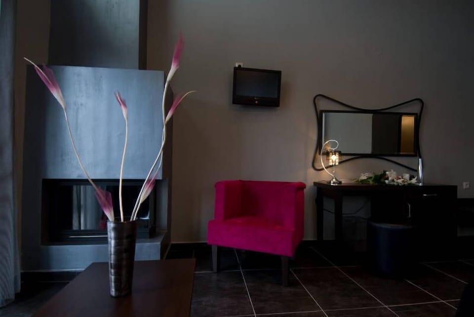 Superior Double Room | Living area | 20-inch flat-screen TV with satellite channels, TV