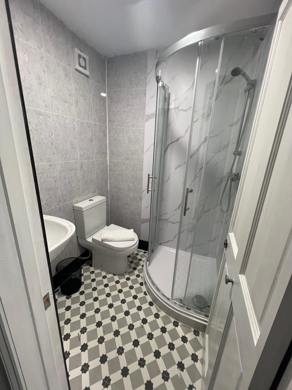 Shower, free toiletries, towels, soap