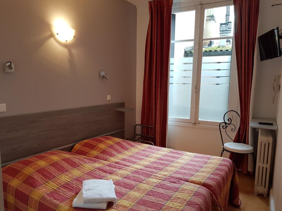 Desk, blackout drapes, rollaway beds (surcharge), WiFi (free)