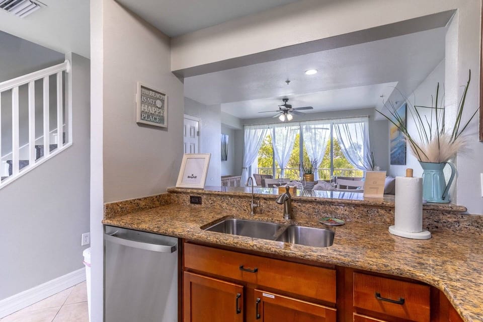 Fully Equipped Kitchen with granite counters and stainless steel appliances (second floor)