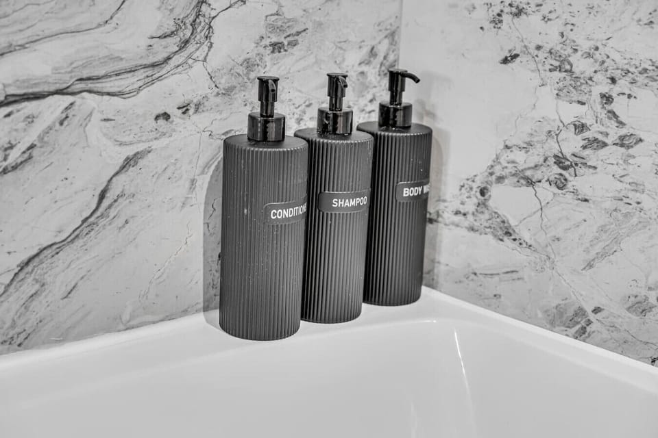 A clean and modern bathroom with all the essentials to help you feel refreshed and comfortable throughout your stay. (Rich Property Management)
