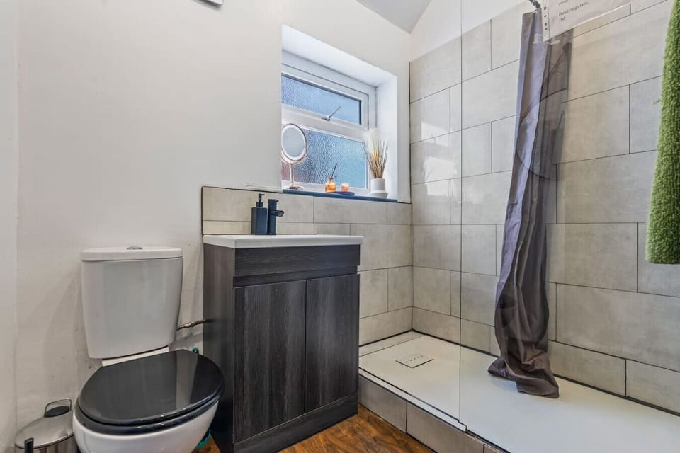 A clean and modern bathroom with all the essentials to help you feel refreshed and comfortable throughout your stay. (Rich Property Management)