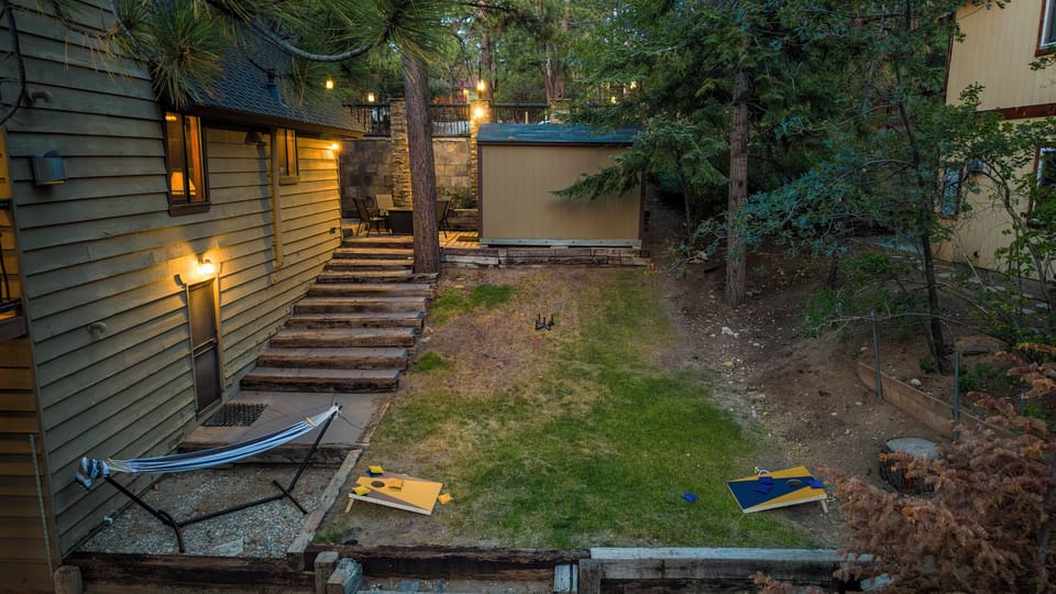 Backyard - Backyard with cornhole and hammock