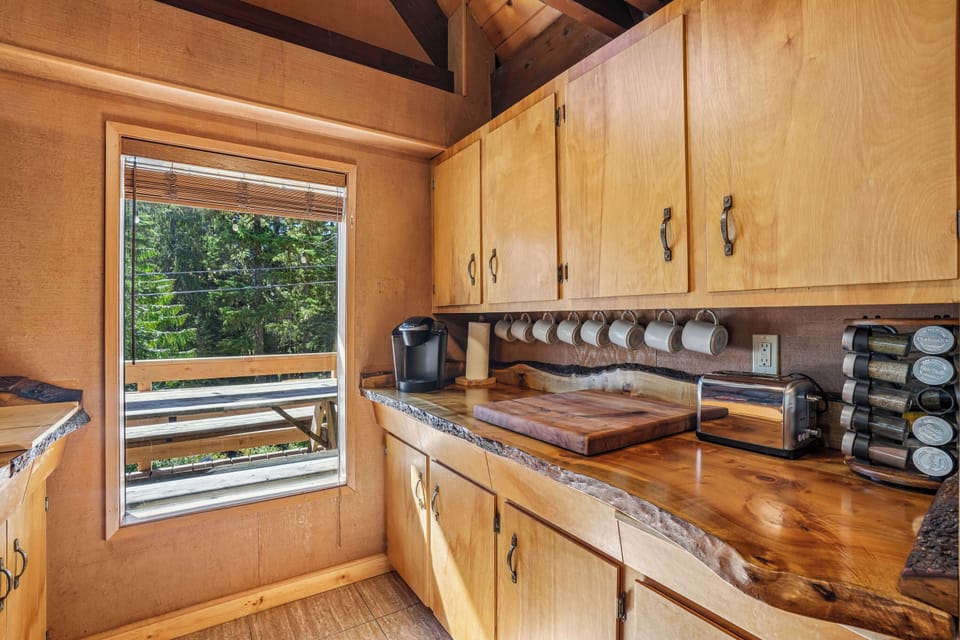 Kitchen Haven: Sunlit space with stunning views, sleek surfaces, and all your cooking essentials!