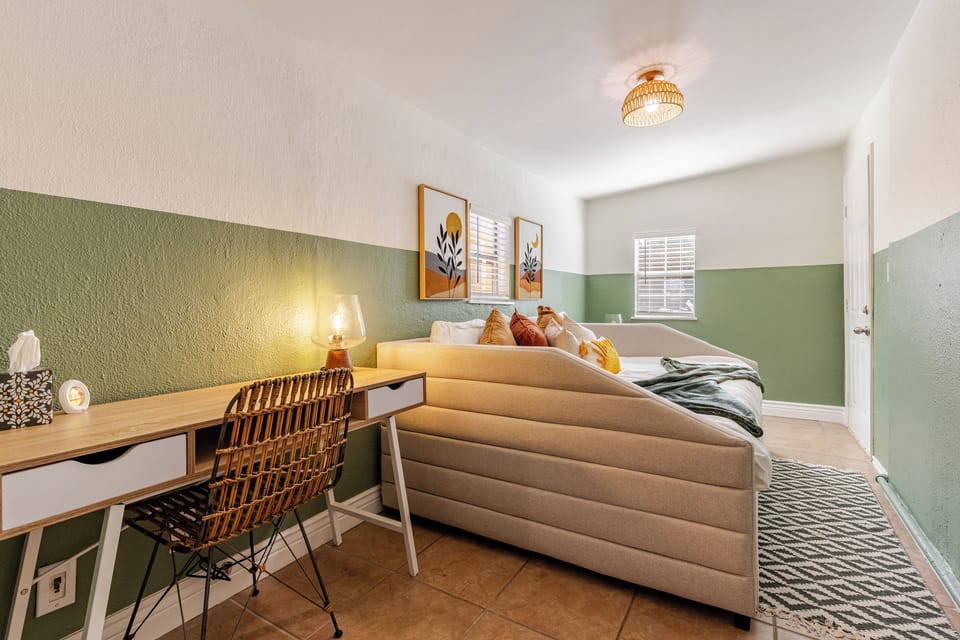 Bright, stylish room with playful decor and a perfect work nook for your getaway!