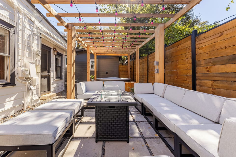 Relax under twinkling lights on this spacious patio perfect for gatherings!