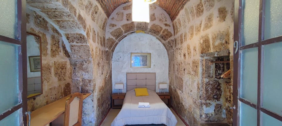 Basic Single Room, 1 Large Twin Bed | Free WiFi, bed sheets