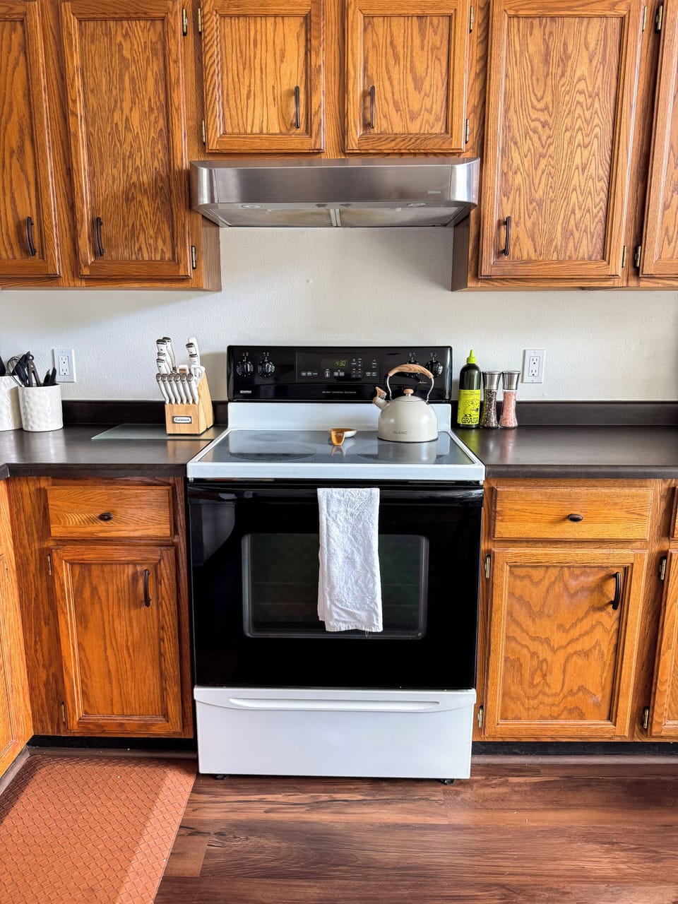 Fully-equipped kitchen with full-size stove and generous cabinet space