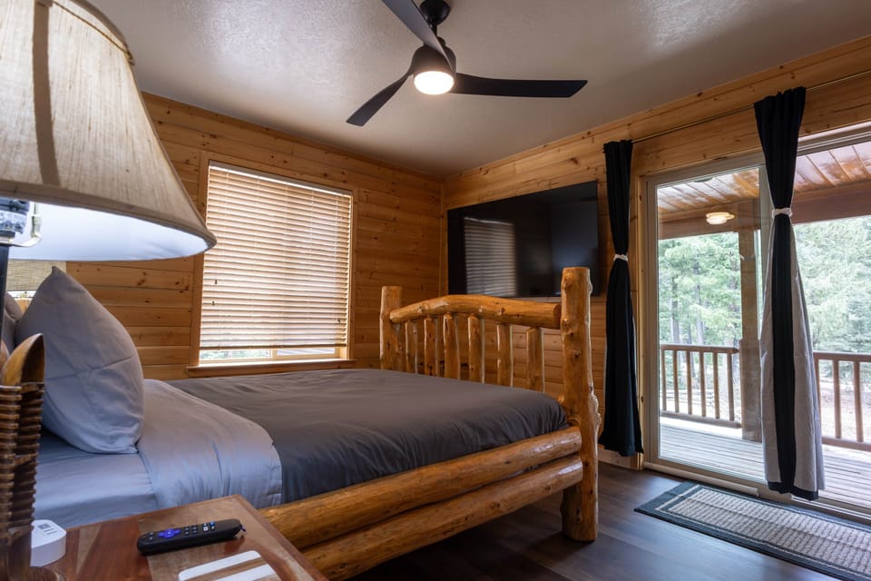 Main-Level Queen Bedroom • Private Deck Access