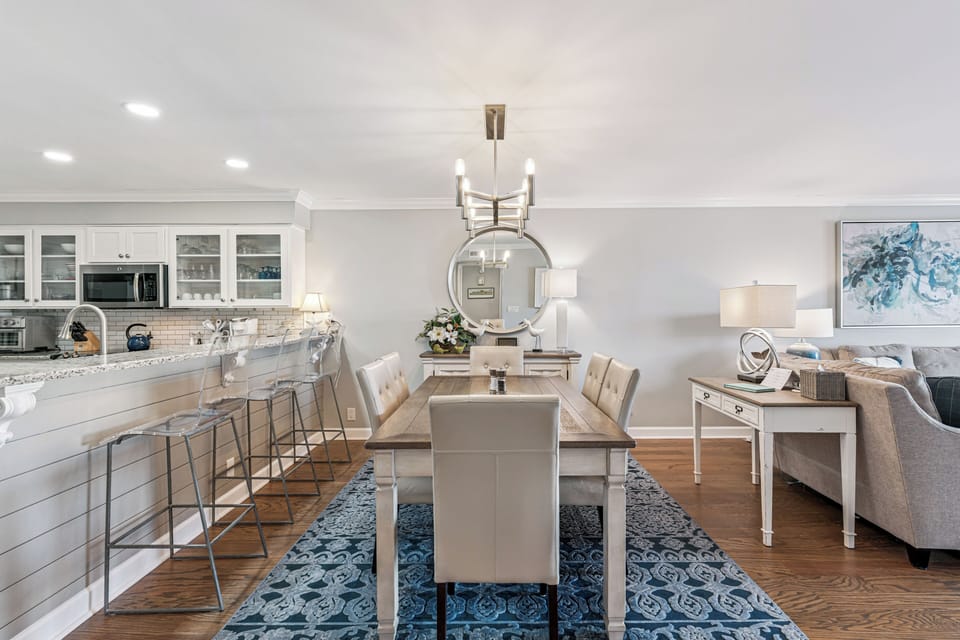 Relax in your elegant open-concept space where the gourmet kitchen flows into a sophisticated dining area, perfect for memorable meals together.