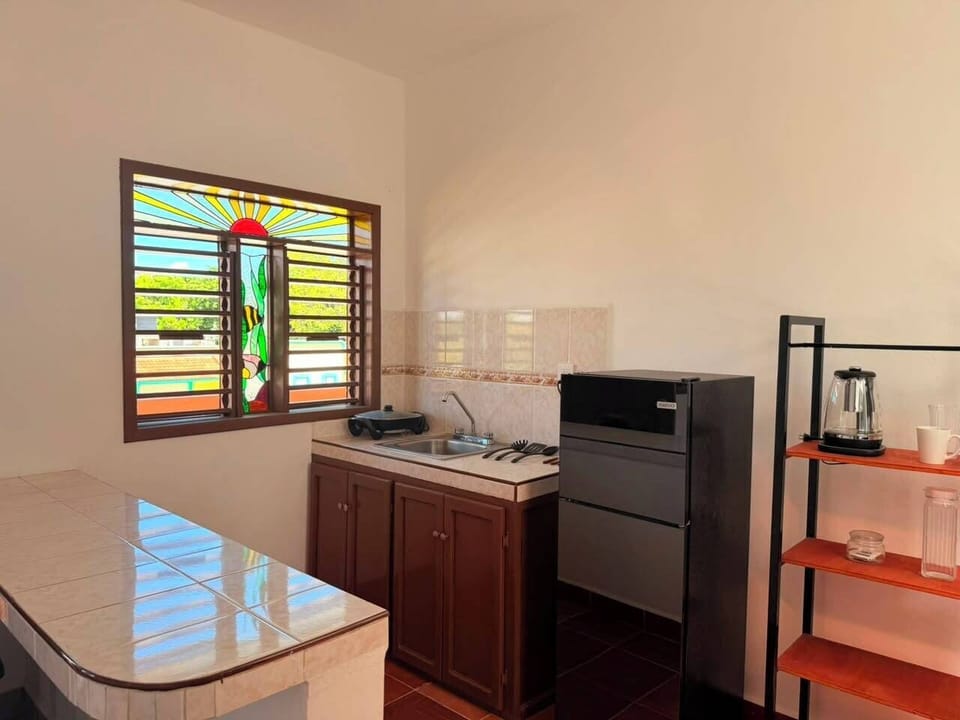 Standard Double Room | Private kitchen | Fridge, cookware/dishes/utensils