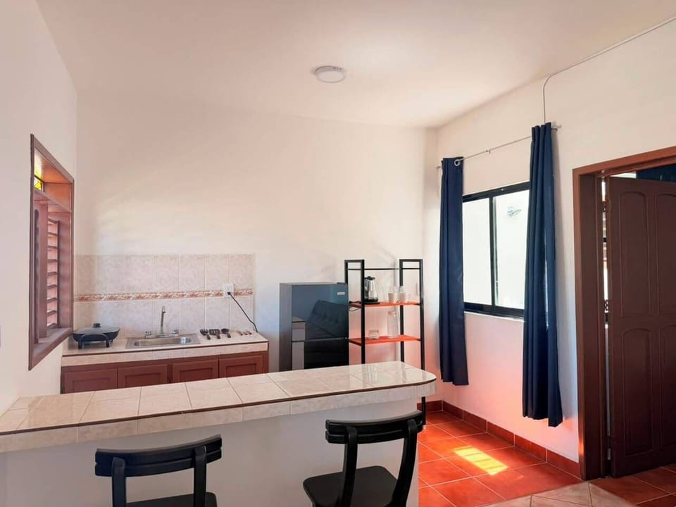 Standard Double Room | Private kitchen | Fridge, cookware/dishes/utensils