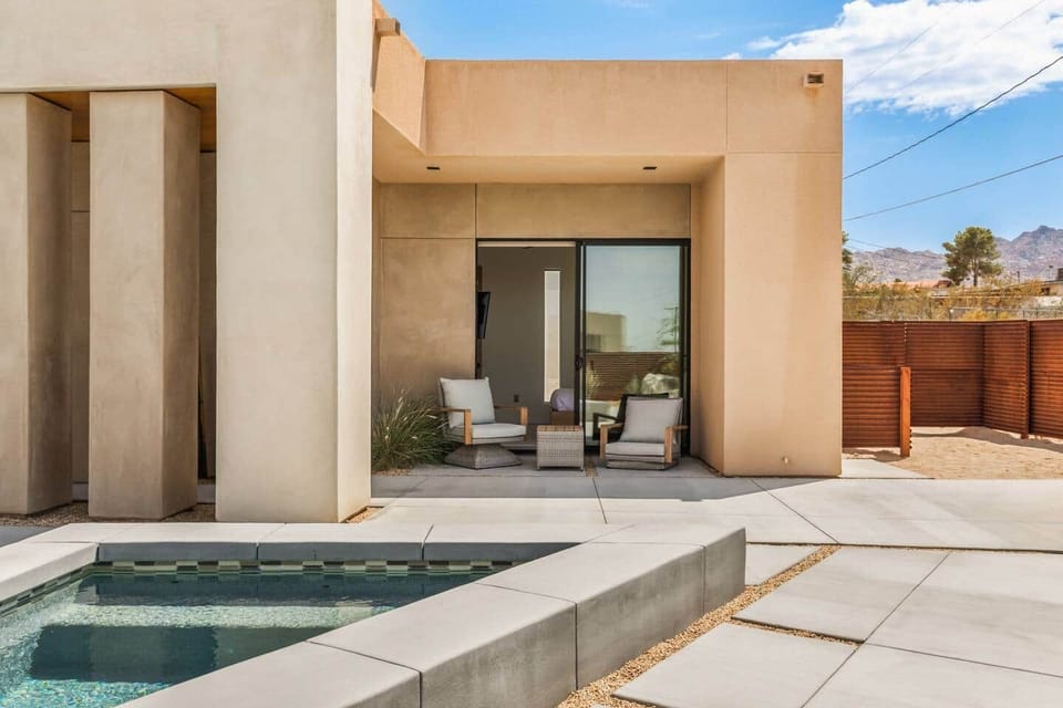 Private patio off of the primary suite is the perfect spot for a night cap or morning coffee
