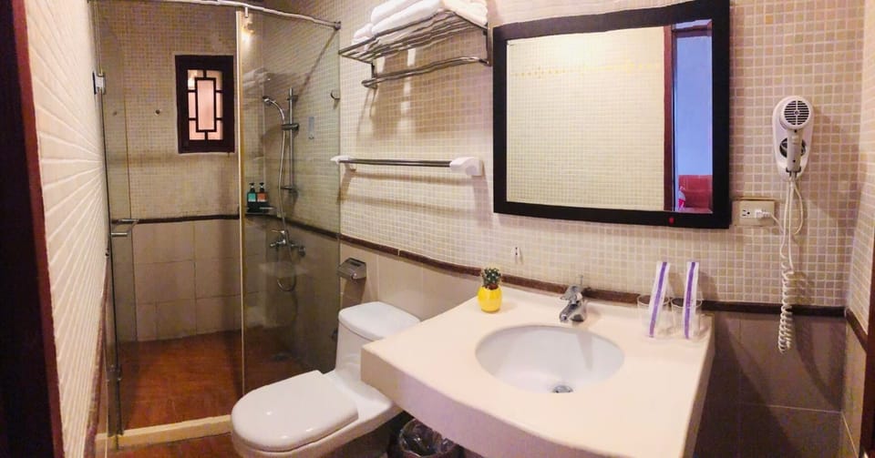 Standard Double Room | Bathroom | Shower, free toiletries, hair dryer, slippers