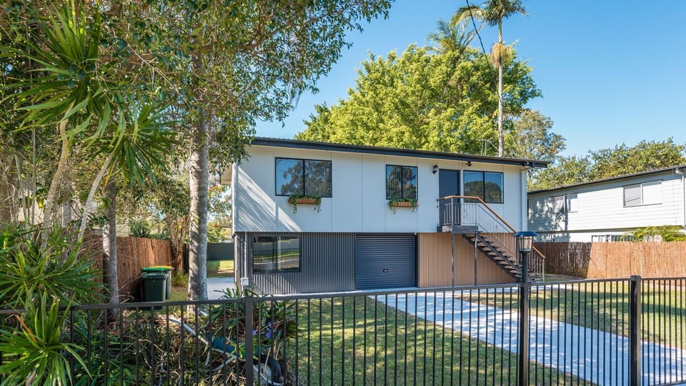 Enjoy views of the home overlooking the fully fenced backyard.