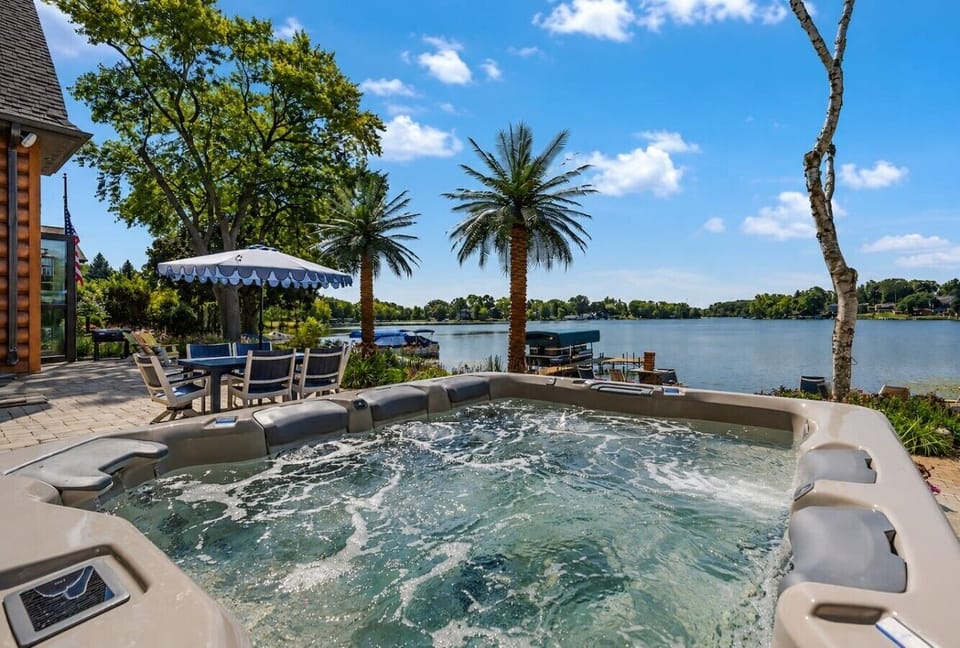 Soak in the 9-person hot tub with an uninterrupted view across Lake Shangri-La.