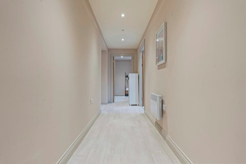 Clean, bright hallway entrance.