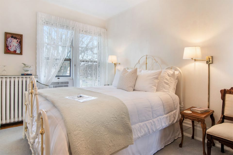The Cassatt Room | Premium bedding, blackout drapes, iron/ironing board, free WiFi