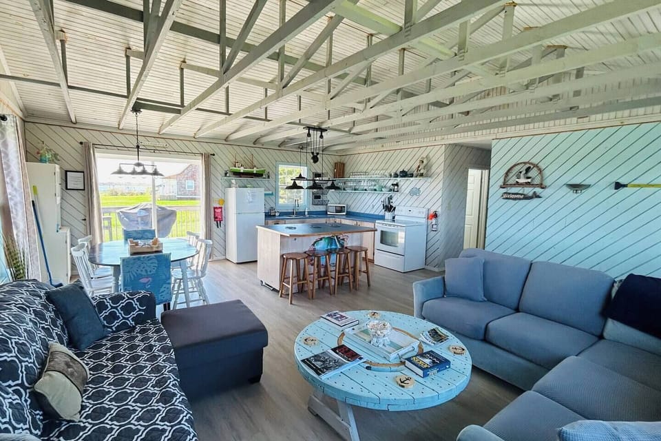 Living room with patio off of the kitchen!