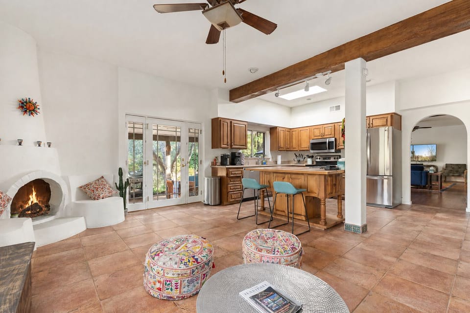 [Kitchen] Cook delicious meals in the home's fully equipped kitchen. Plus, hang out fireside by the nearby breakfast nook/seating area.