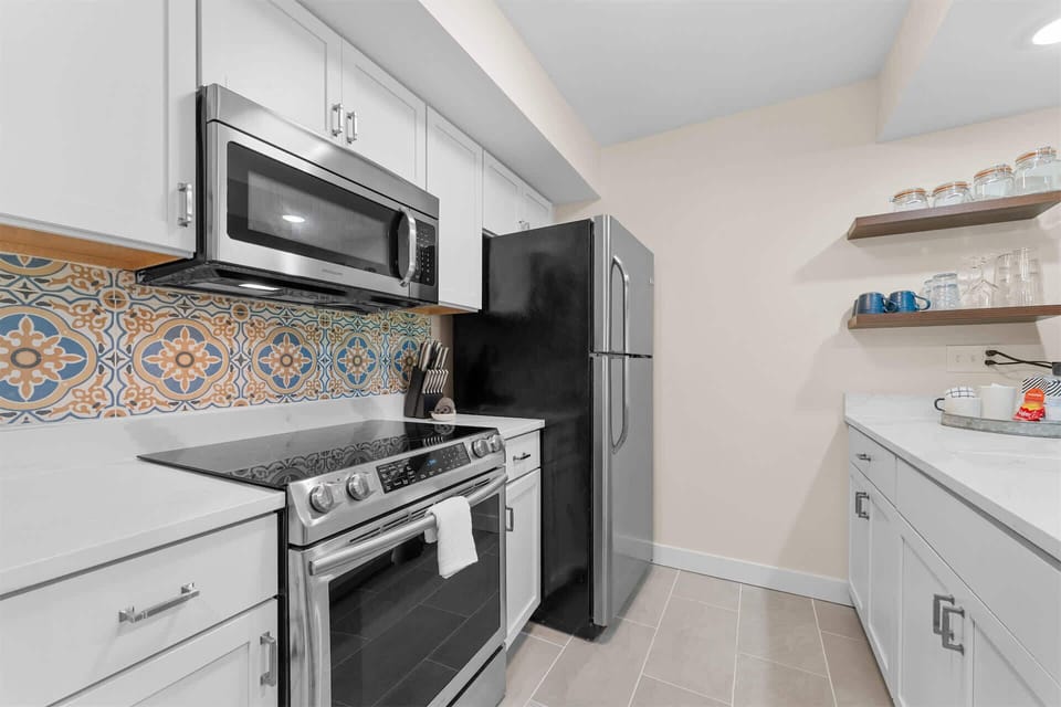 The open kitchen is well equipped for an unforgettable getaway​