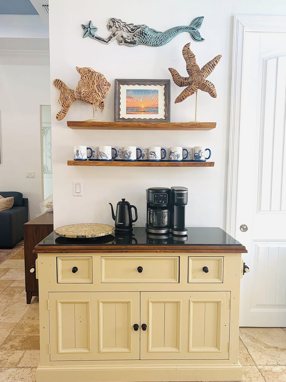 Full-service coffee bar with a tea kettle, regular coffee pot and a Keurig so everyone is covered and can make their brew how they like it. 