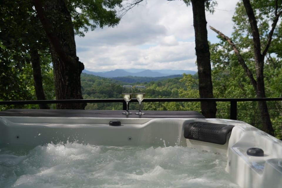 Relax in the private hot tub while taking in long-range mountain views.