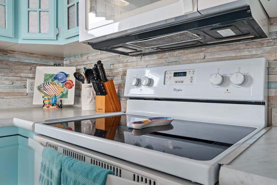 The home features a modern electric stove, giving guests a reliable and easy‑to‑use cooking option during their stay.