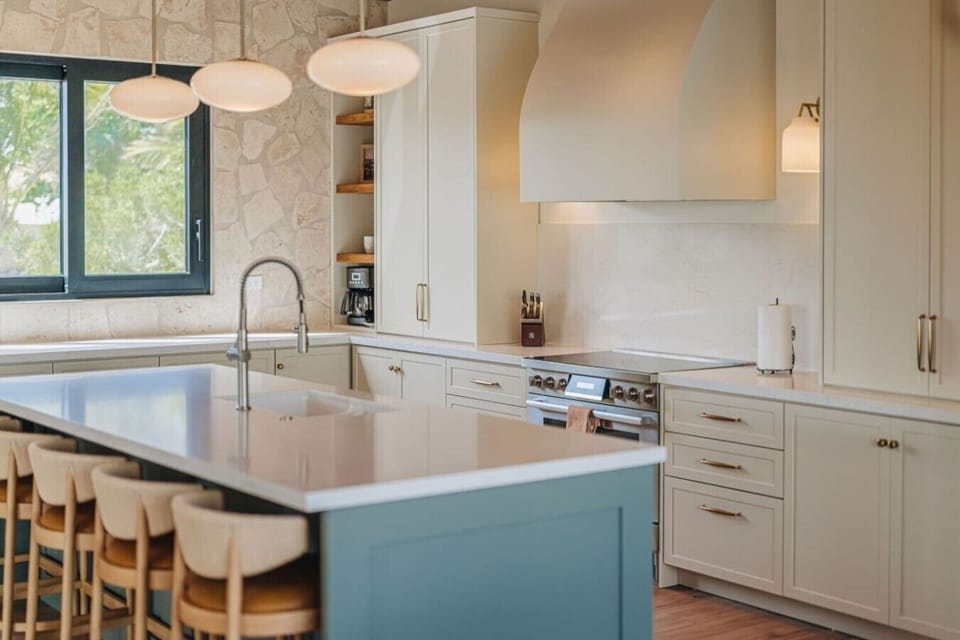 Cook, gather, and enjoy time together in this beautiful, fully equipped kitchen. With a spacious island, plenty of counter space, and comfortable seating, it’s a lovely spot to make meals and memories.