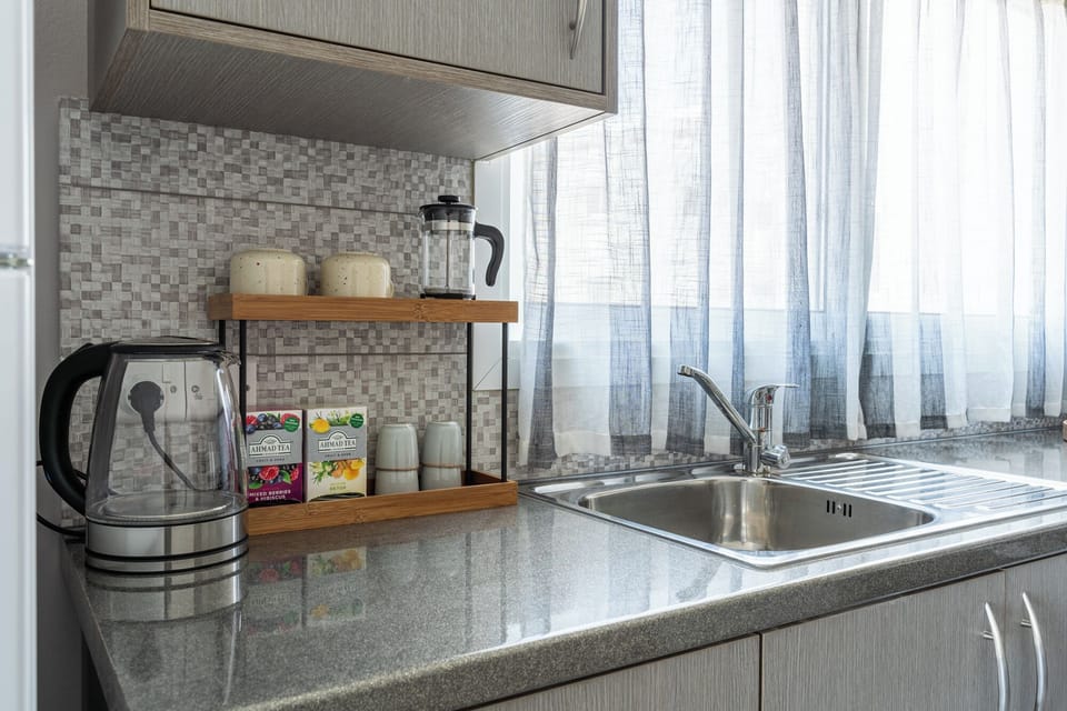 Apartment, Balcony | Private kitchen | Coffee/tea maker, electric kettle