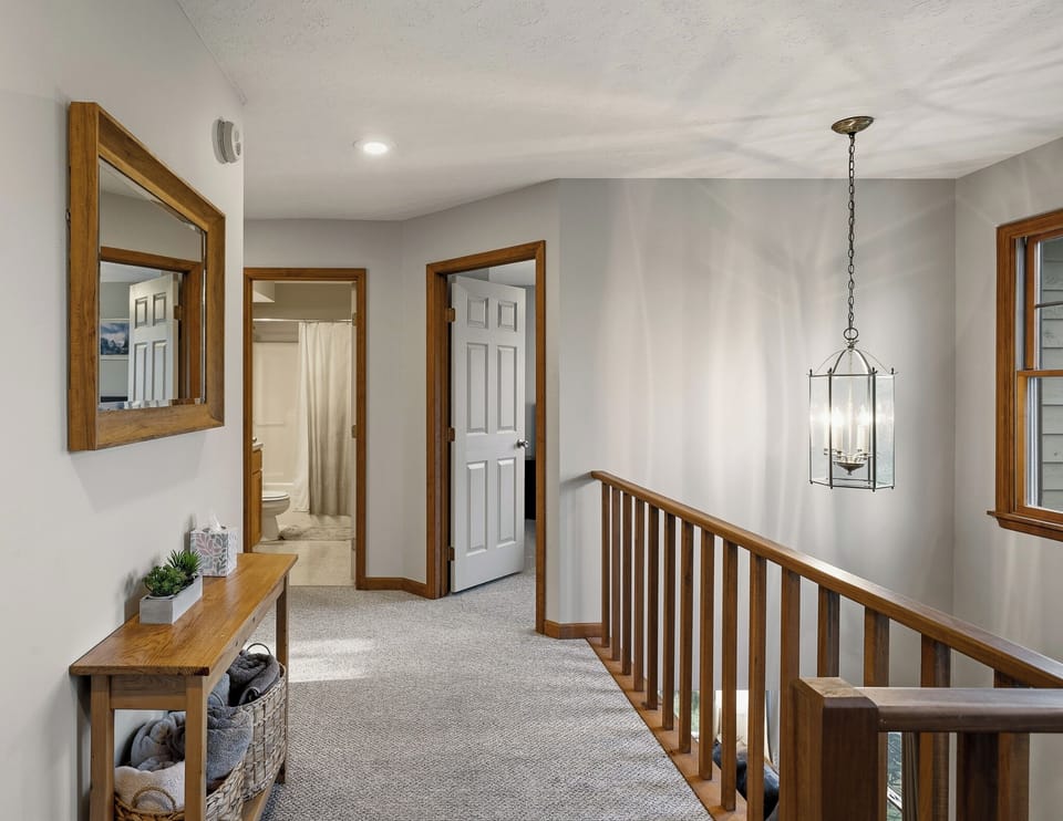 Upstairs hallway with access to the home's bedrooms.