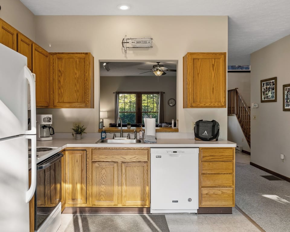 Bright kitchen with generous cabinetry and workspace.