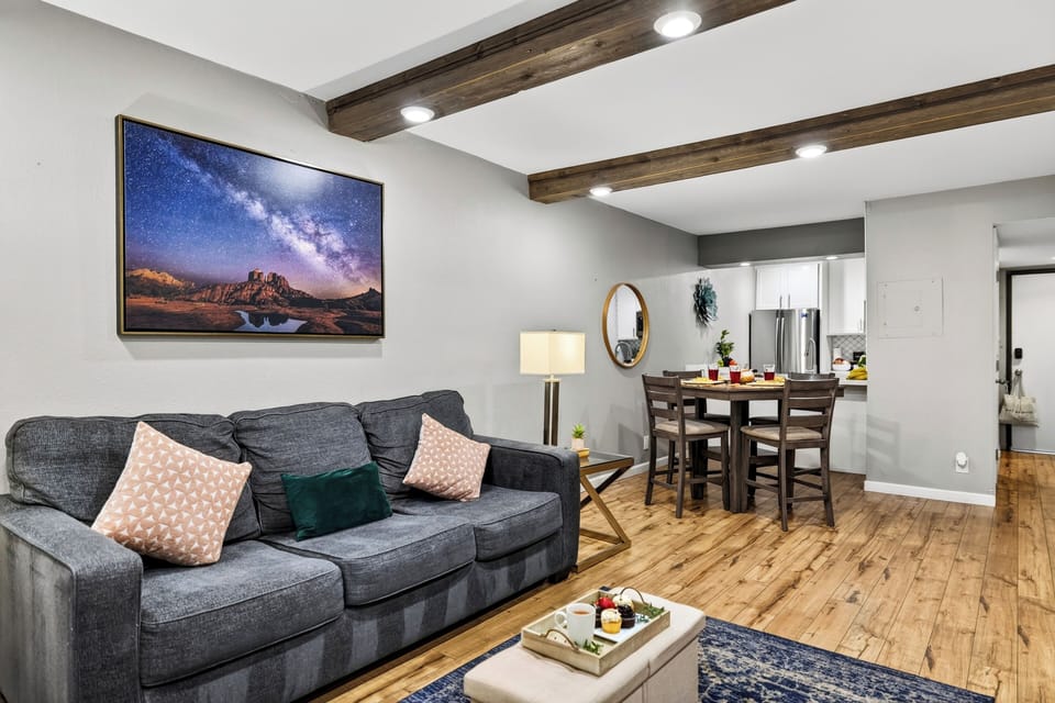 Open-concept layout displaying seamless flow between living and dining areas.