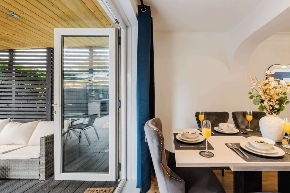 Bright dining area with elegant table and seating.