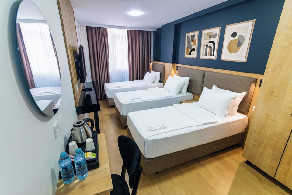 Standard Triple Room, City View | Egyptian cotton sheets, premium bedding, Select Comfort beds, minibar
