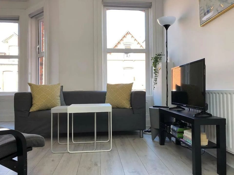 Living area with sofas and TV