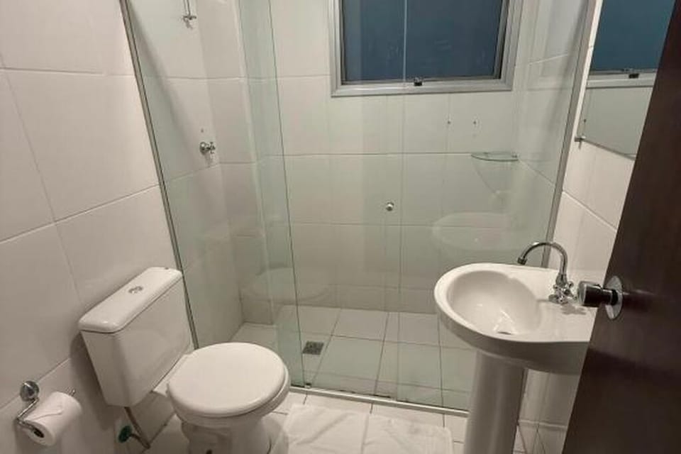 Basic Double Room | Bathroom | Shower, towels, soap, toilet paper