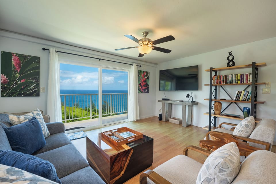 Sink into the sofa with the Pacific filling the sliders from where you sit.
