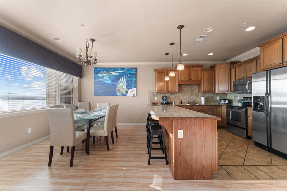 The open kitchen offers ample space & all the comforts of home​