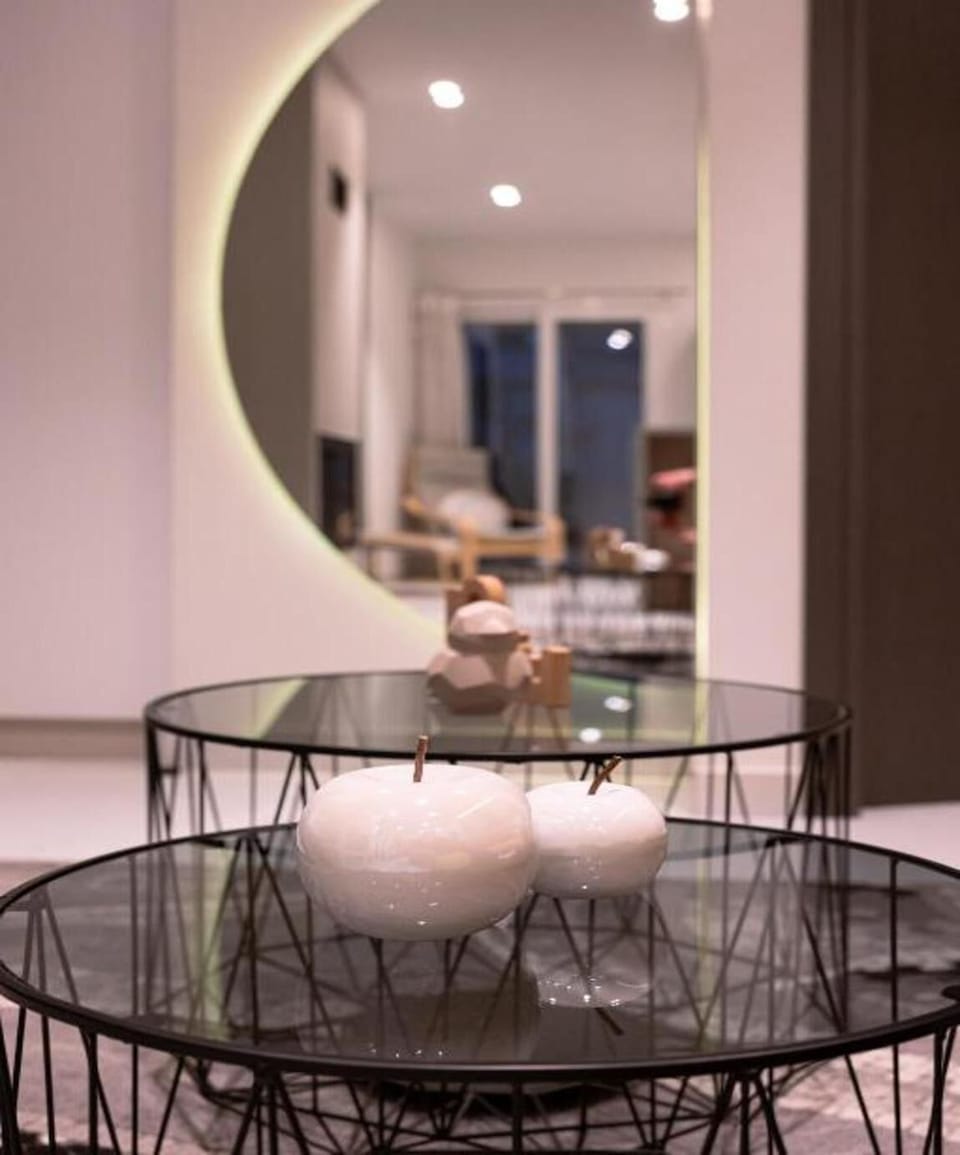 Relax in the comfortable living area after a day exploring Patras, with a bright and inviting space designed for everyday comfort.