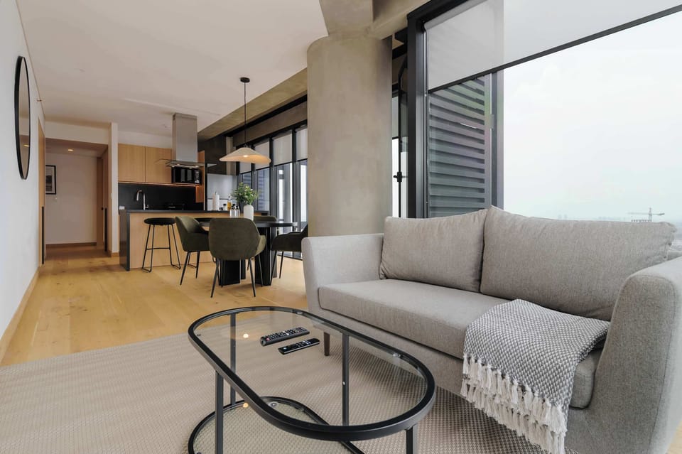 Open-concept living area connected to the dining room and kitchen.