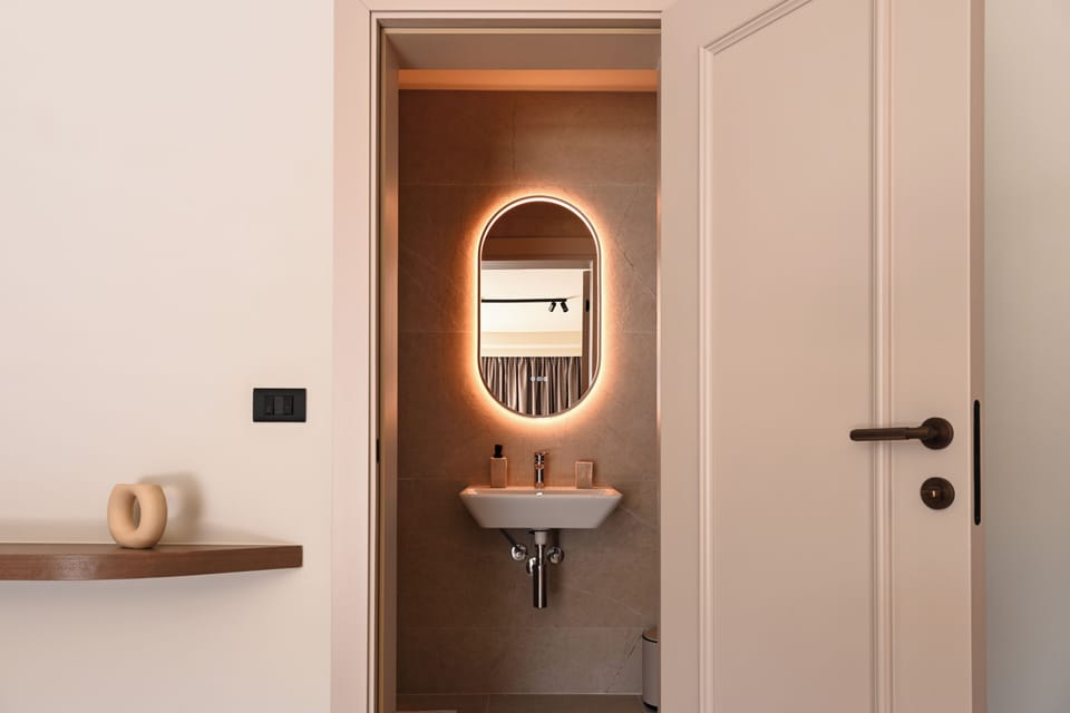 Deluxe Triple Room, Sea Facing | Bathroom | Shower, free toiletries, hair dryer, bathrobes
