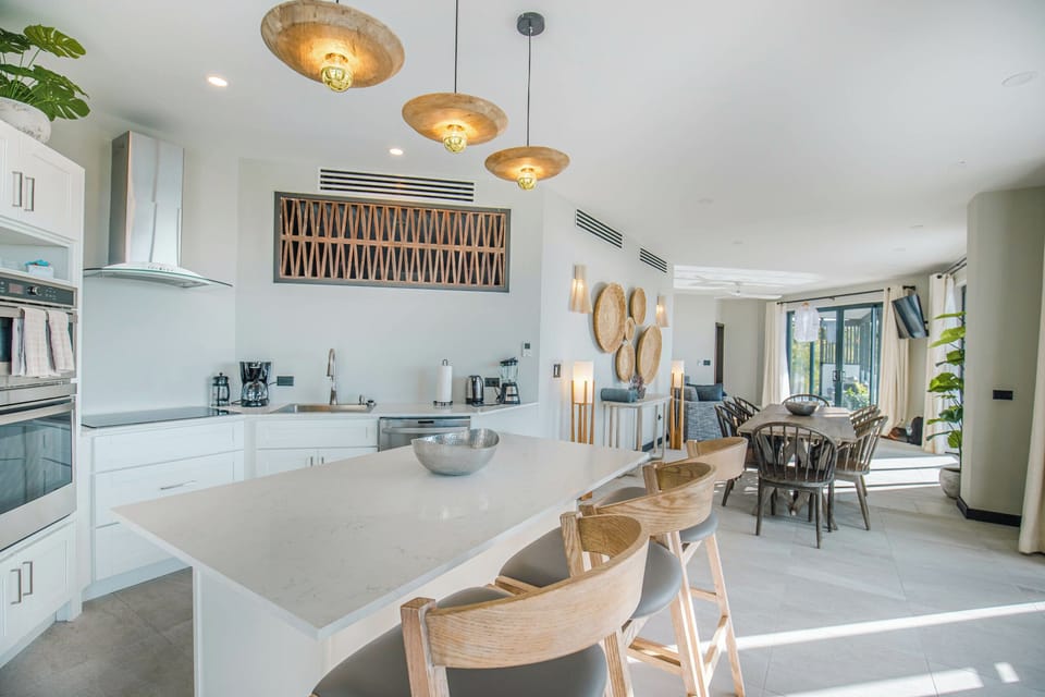 Cook together in a sleek, fully equipped open kitchen.