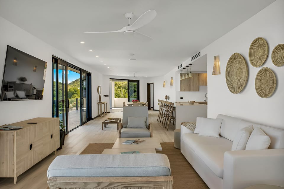 Stretch out in an airy lounge with coastal-chic style.