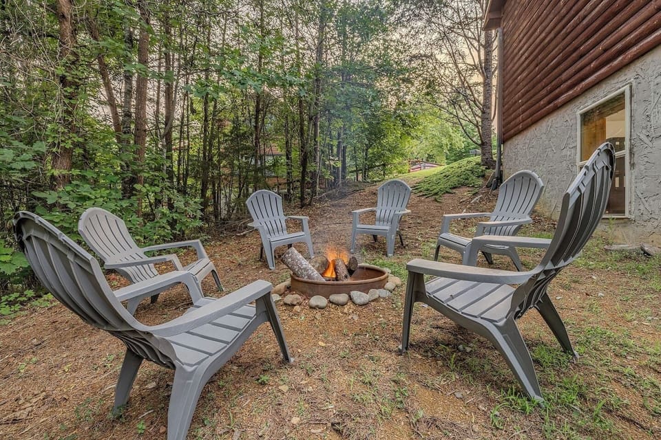 Outdoor fire pit perfect for roasting marshmallows, sharing stories, and enjoying cool Smokey Mountain evenings.